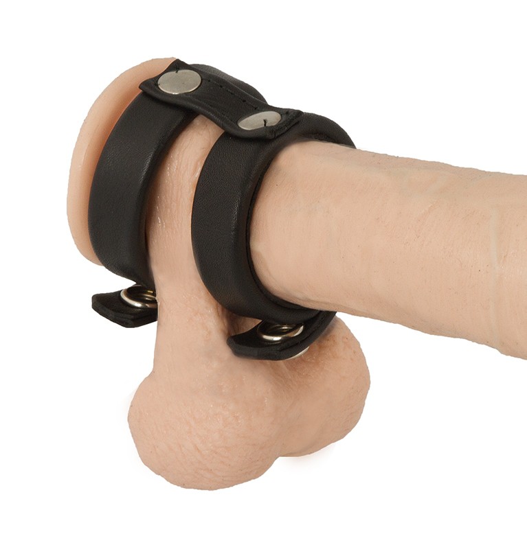 Penis- und Hodenband mit Innen-Dornen aus Leder Penis- und Hodenband aus schwarzem Leder mit Innen-Dornen und Druckknopfverschluss